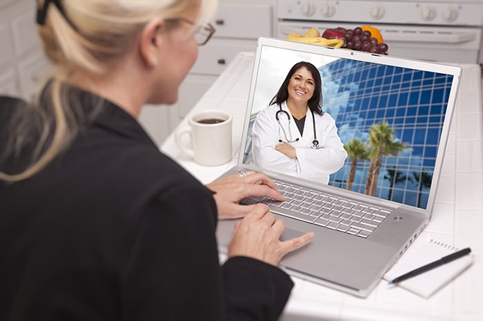 Woman Laptop Online Chat with Doctor